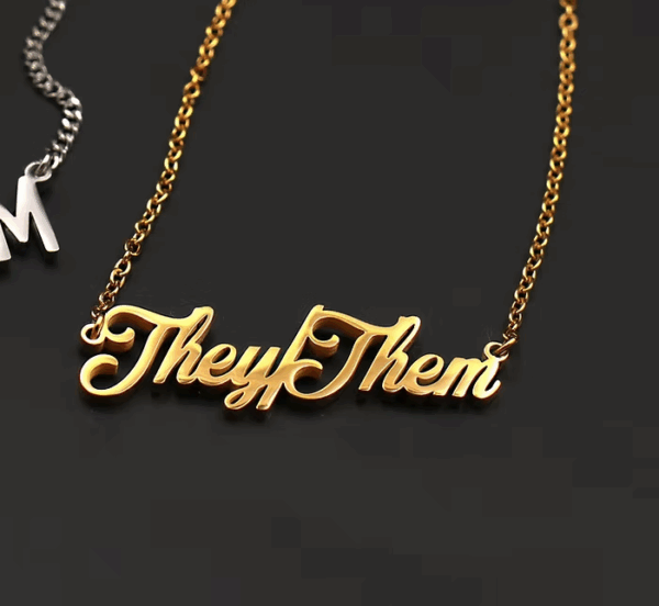 TOPPLE & BURN gold they/them cursive necklace - Image 2