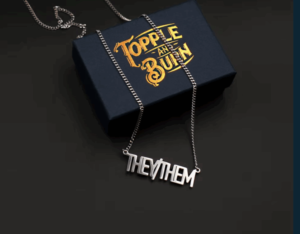 TOPPLE & BURN THEY/THEM caps silver necklace - Image 2